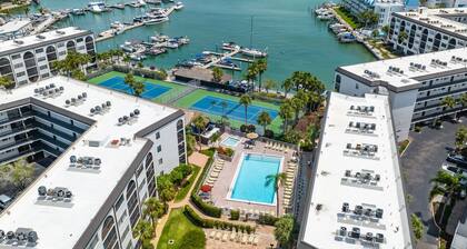 Waterfront 1BR condo in Marco Island with pool, WiFi, and marina access.