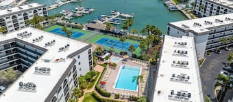 Waterfront 1BR condo in Marco Island with pool, WiFi, and marina access.