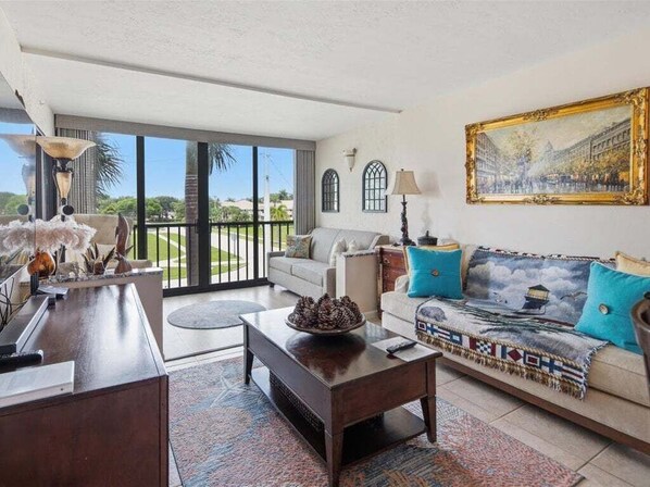 TV - Waterfront 1BR condo in Marco Island with pool, WiFi, and marina access. (Marco Island)