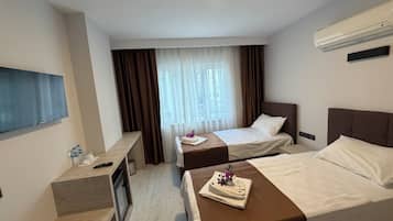 Economy Room, 1 Bedroom, Garden View | Laptop workspace, soundproofing, free WiFi, bed sheets