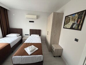 Economy Room, 1 Bedroom, Garden View | Laptop workspace, soundproofing, free WiFi, bed sheets - Altınay Suite Hotel (Konyaalti)