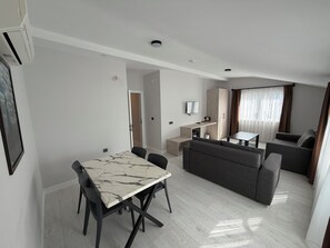 Family Room, Multiple Beds | Living area | LCD TV - Altınay Suite Hotel (Konyaalti)