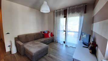 Apartment, 2 Bedrooms | Living area | Flat-screen TV