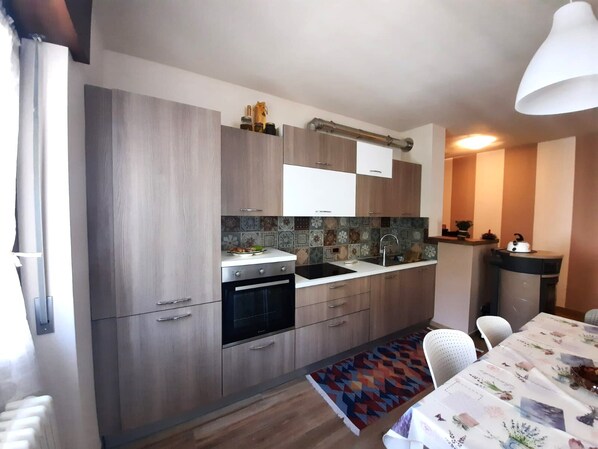 Appartement, 2 chambres | Cuisine privée | Réfrigérateur, four, plaque de cuisson, lave-vaisselle
