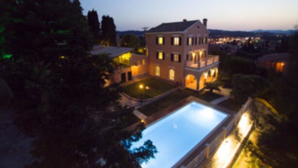 A large, multi-story building with a swimming pool in the foreground. - Private Pool & Breathtaking Views, Corfu Villa 1000 (Corfu)