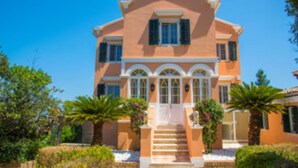 A two-story house with a central entrance, a staircase leading up to the door, and a small porch area. - Private Pool & Breathtaking Views, Corfu Villa 1000 (Corfu)
