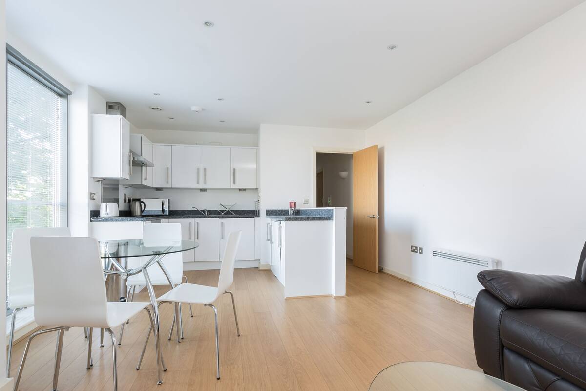 One-Bedroom Apartment (Flat 25) | Living area | Flat-screen TV