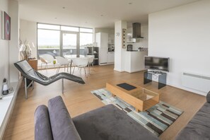 Three-Bedroom Penthouse (Flat 76) | Living area | Flat-screen TV - Heron House (Bedford)
