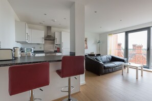 Two-Bedroom Apartment (Flat 67) | Living area | Flat-screen TV - Heron House (Bedford)