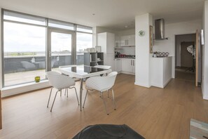 Three-Bedroom Penthouse (Flat 76) | Private kitchen | Full-sized fridge, microwave, oven, stovetop - Heron House (Bedford)