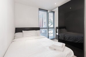 Apartamento de lujo | Tabla de planchar con plancha, wifi gratis, ropa de cama