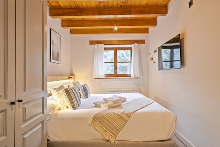 1 室のベッドルーム、アイロン / アイロン台、WiFi、ベッドシーツ. Luderna - Apartamento con jardín Montardo