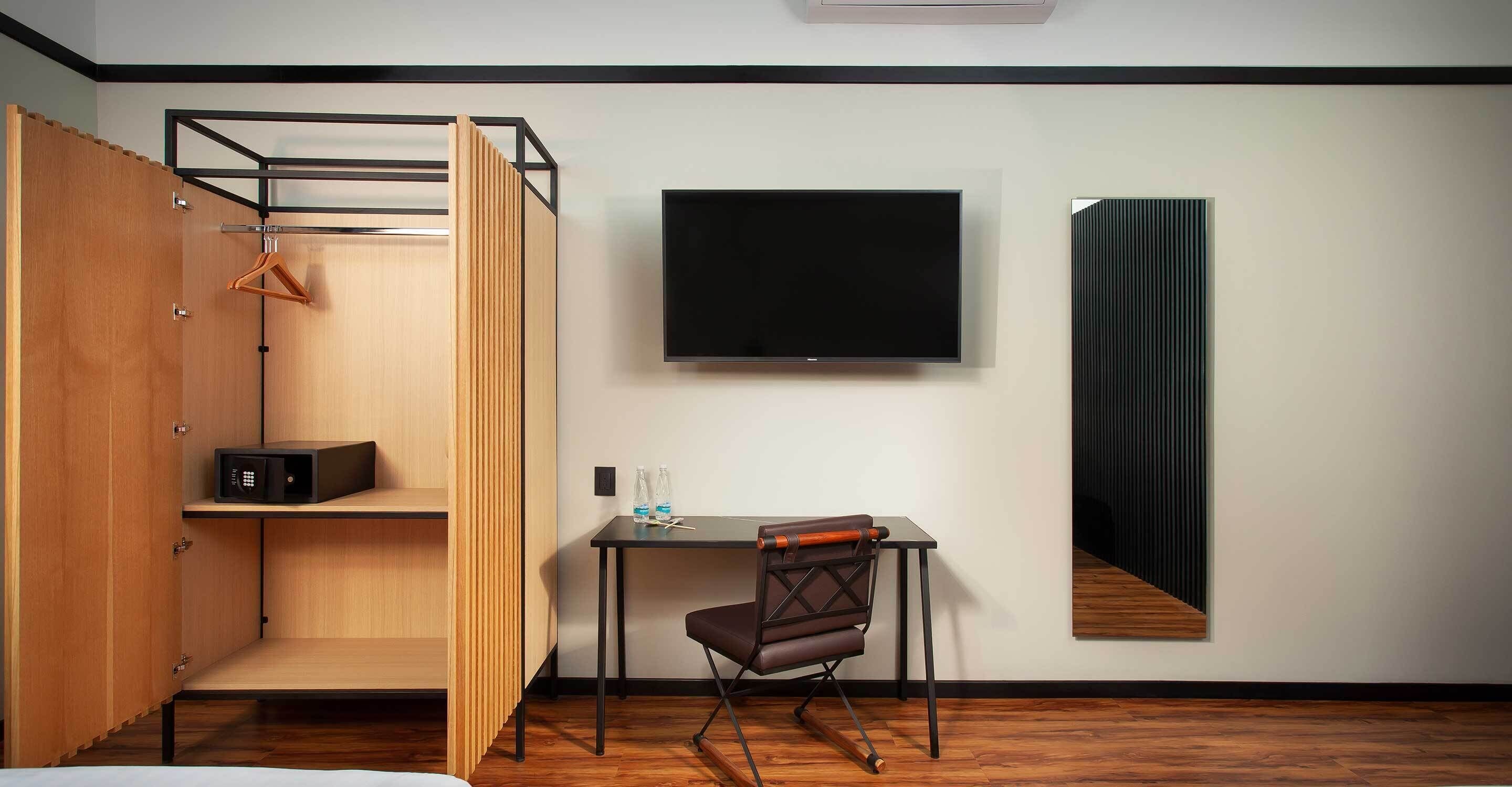 family studio suite | in-room safe, desk, laptop workspace, blackout curtains