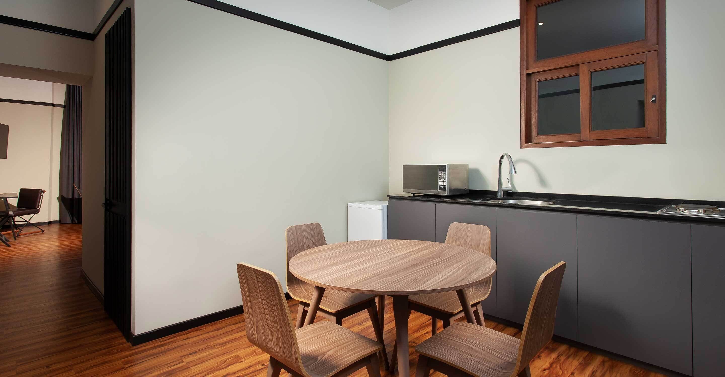 superior studio suite | in-room safe, desk, laptop workspace, blackout curtains