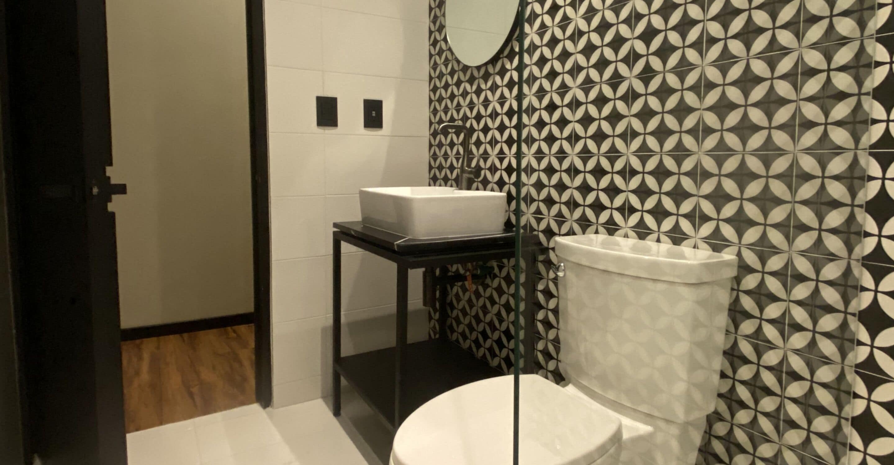 shower, rainfall showerhead, hair dryer, towels