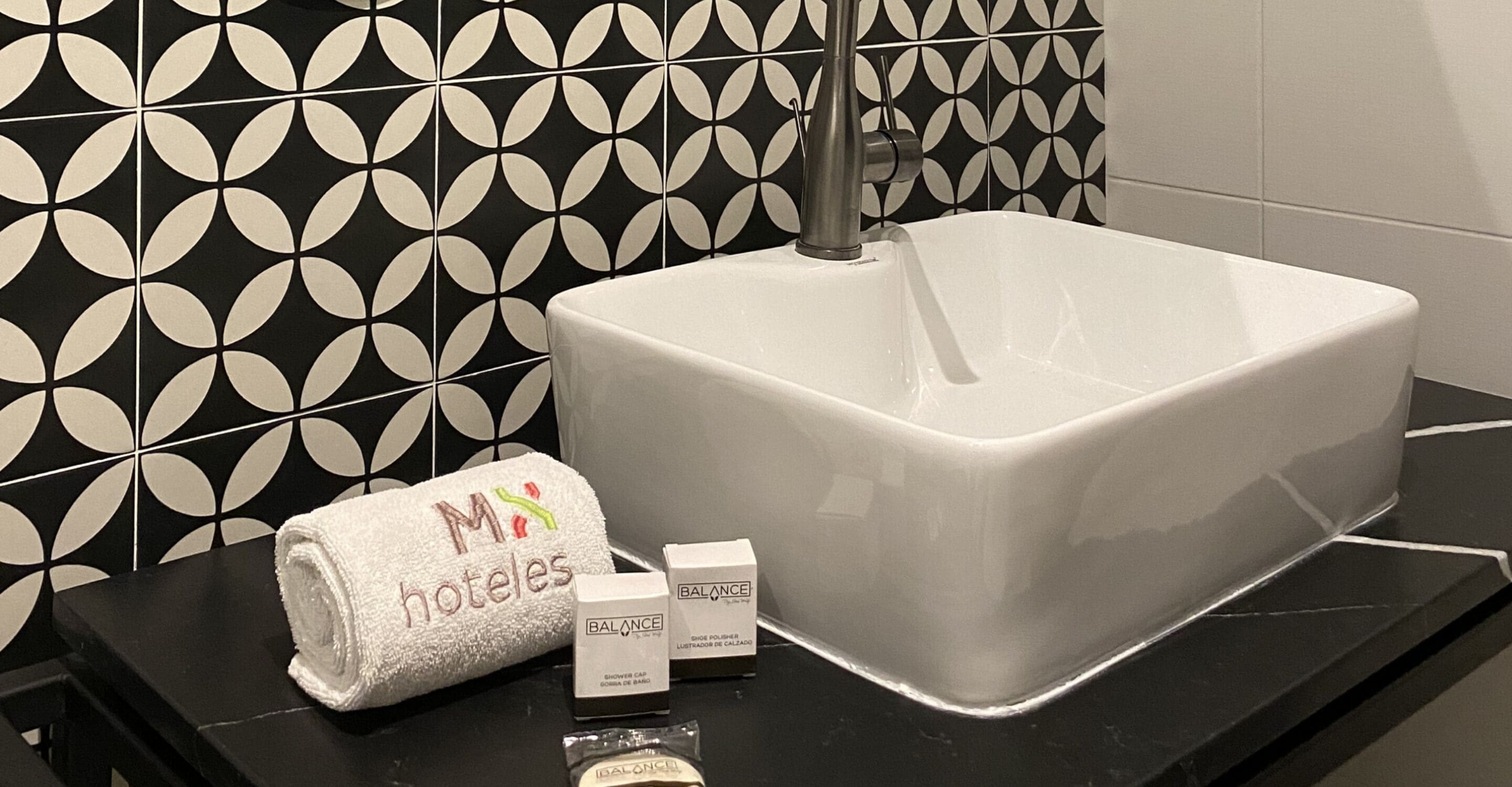 shower, rainfall showerhead, hair dryer, towels