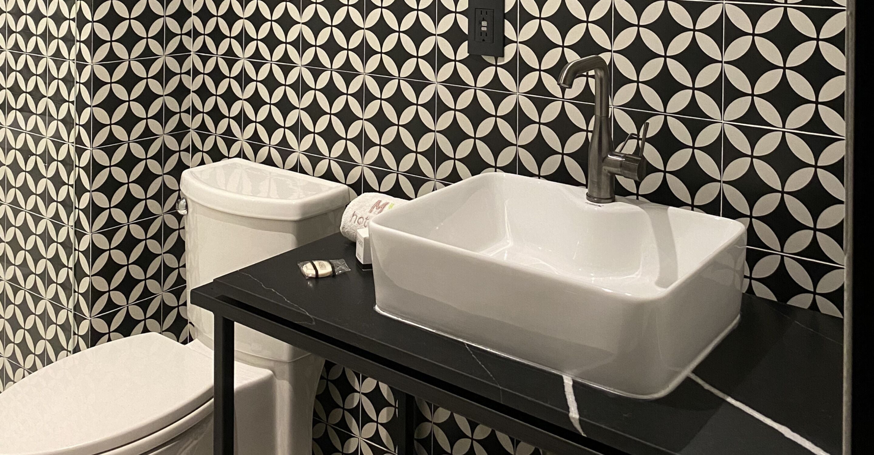 shower, rainfall showerhead, hair dryer, towels