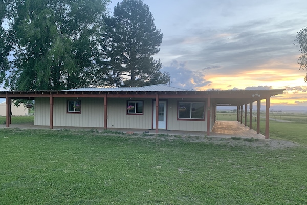 Our wrap-around porch is a great place to hang out, relax, and take in the view