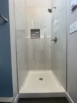 Combined shower/tub, hair dryer, towels, soap
