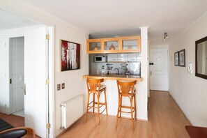 Apartment, 1 Double Bed, Private Bathroom | 1 bedroom, laptop workspace, blackout curtains, iron/ironing board - Boutique El Golf (Santiago)