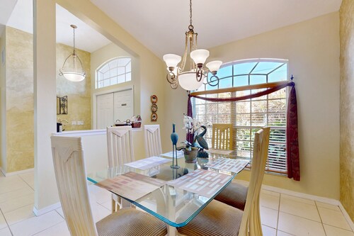 Snowbird-friendly home with lanai, private pool, & canal access