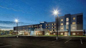 A modern hotel with a flat roof, multiple floors, and a parking lot in front. - Residence Inn by Marriott Columbus Airport (Columbus)