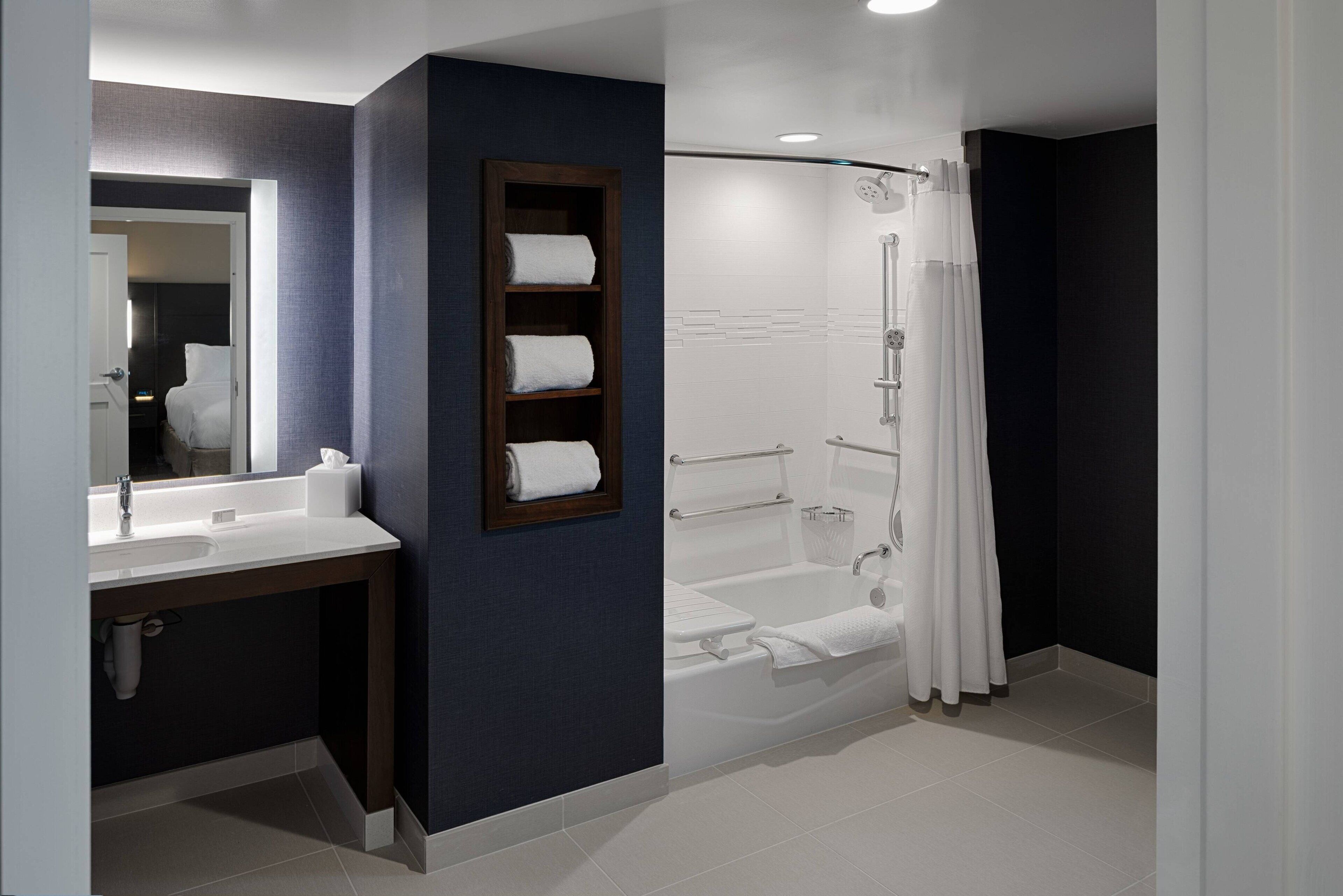 hydromassage showerhead, free toiletries, hair dryer, towels