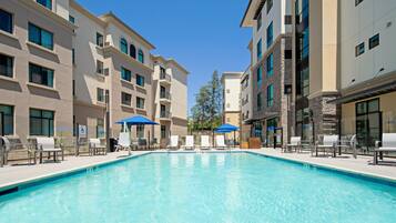 Outdoor pool, open 8:00 AM to 10:00 PM, pool umbrellas, pool loungers