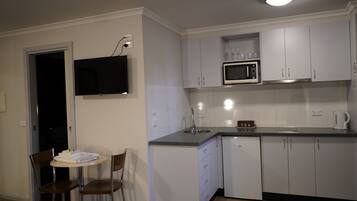 Fridge, microwave, toaster, cookware/dishes/utensils