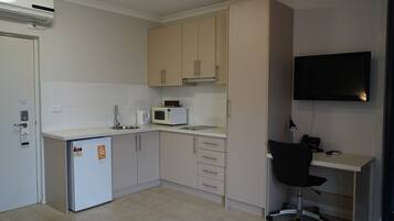 Fridge, microwave, toaster, cookware/dishes/utensils