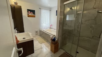 Combined shower/tub, eco-friendly toiletries, hair dryer, towels