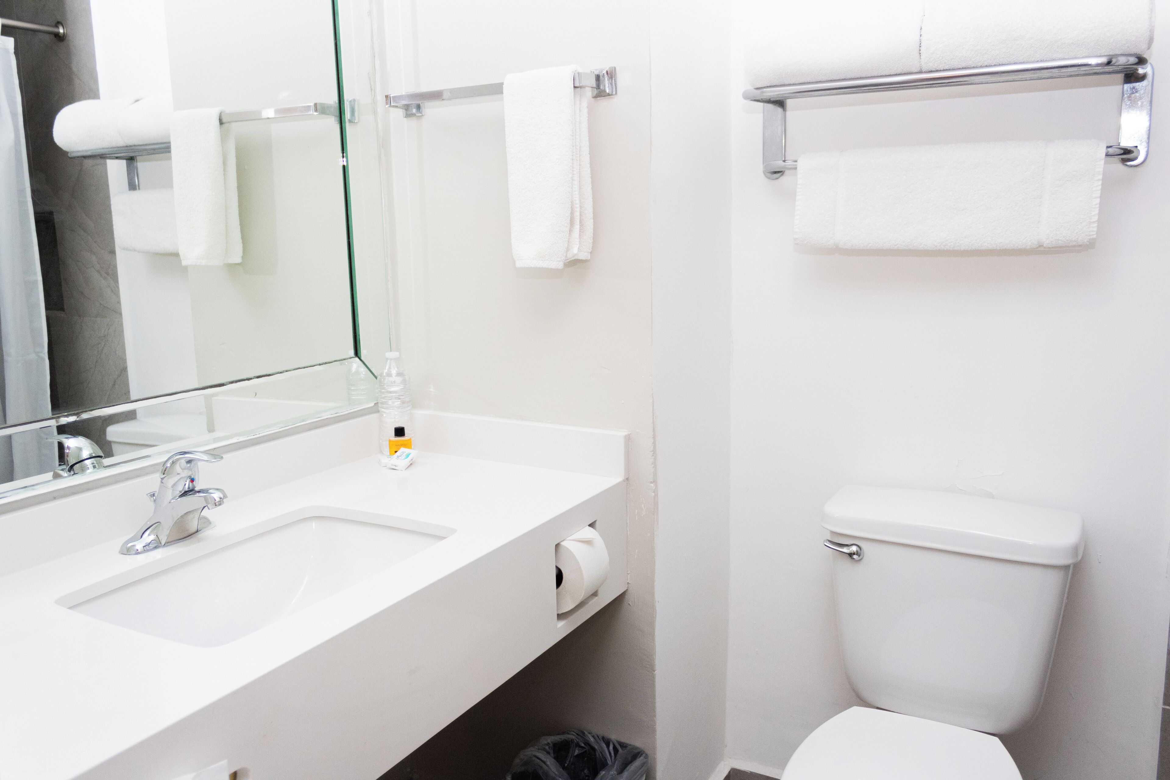 rainfall showerhead, hair dryer, towels, soap