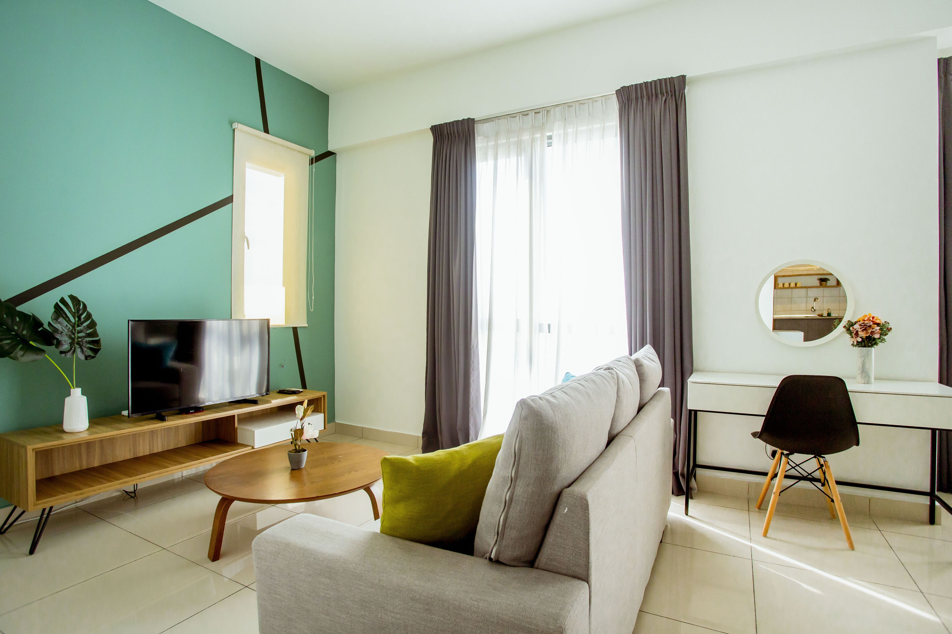 Monolocale Executive | Area soggiorno | TV a schermo piatto