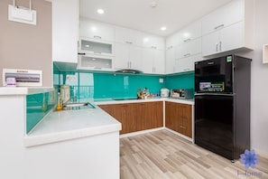 Fridge, microwave, cookware/dishes/utensils
