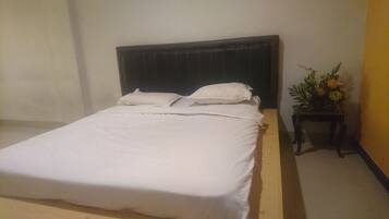 Laptop workspace, free WiFi, bed sheets