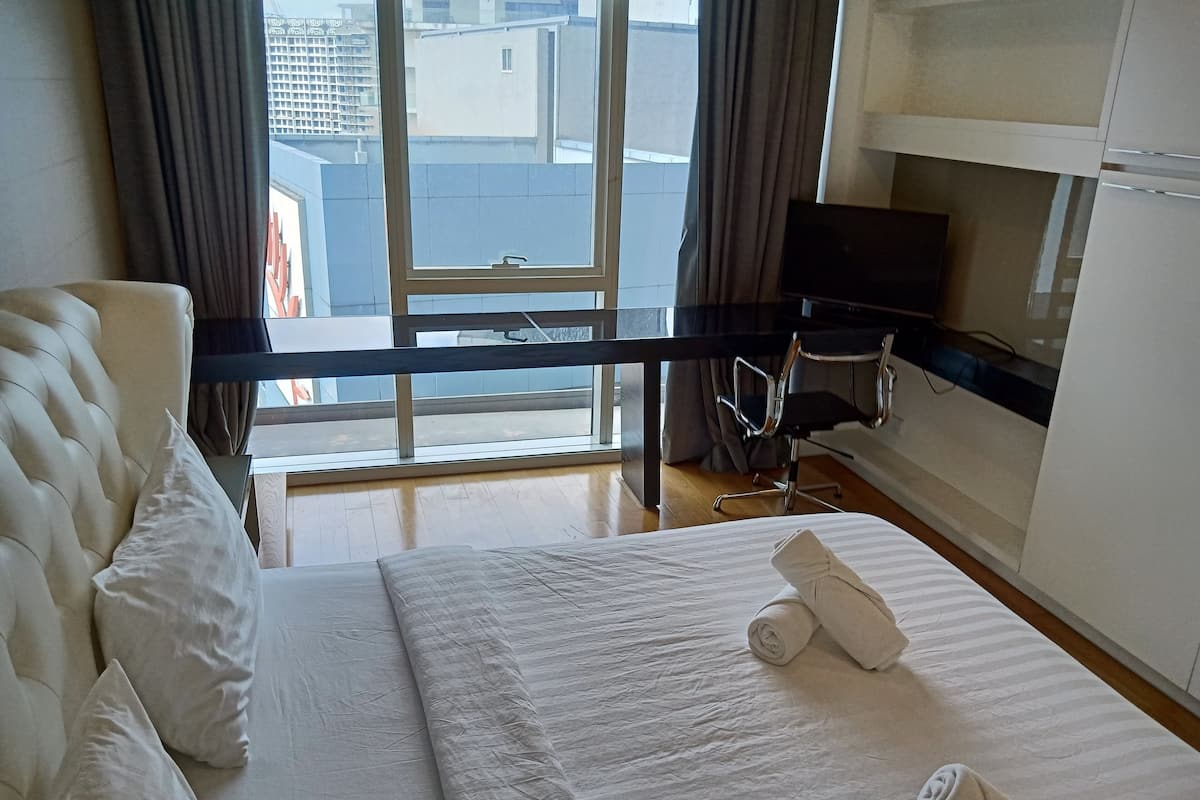 2 bedrooms, desk, laptop workspace, iron/ironing board