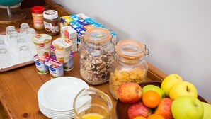 A breakfast buffet with various food items and beverages. - The Climbers Inn (Glencar)