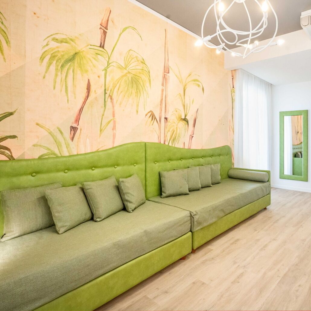 quadruple room | living area | flat-screen tv