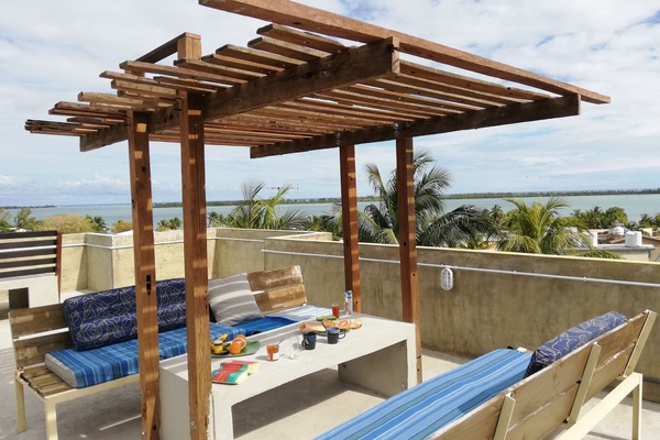 Endless Ocean and Mountain views with a communal dining area & Giant sunbeds