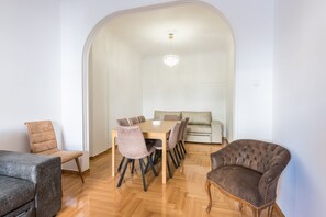 Apartment, 3 Bedrooms | Living area | Flat-screen TV