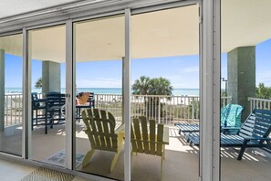 Deluxe Condo, 3 Bedrooms, Ocean View (106-3) | Living area | 32-inch flat-screen TV with cable channels, TV - Long Beach by Book That Condo (Panama City Beach)