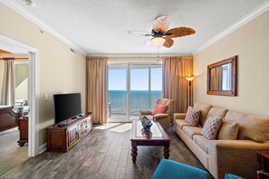 Condo, 2 Bedrooms, Balcony, Ocean View (1801) | Living area | 32-inch flat-screen TV with cable channels, TV - Ocean Villa Resort by Book That Condo (Panama City Beach)
