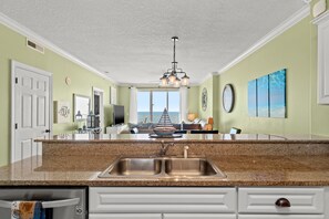 Condo, 2 Bedrooms, Balcony, Ocean View (801) | Private kitchen | Full-size fridge, microwave, stovetop, dishwasher - Ocean Villa Resort by Book That Condo (Panama City Beach)
