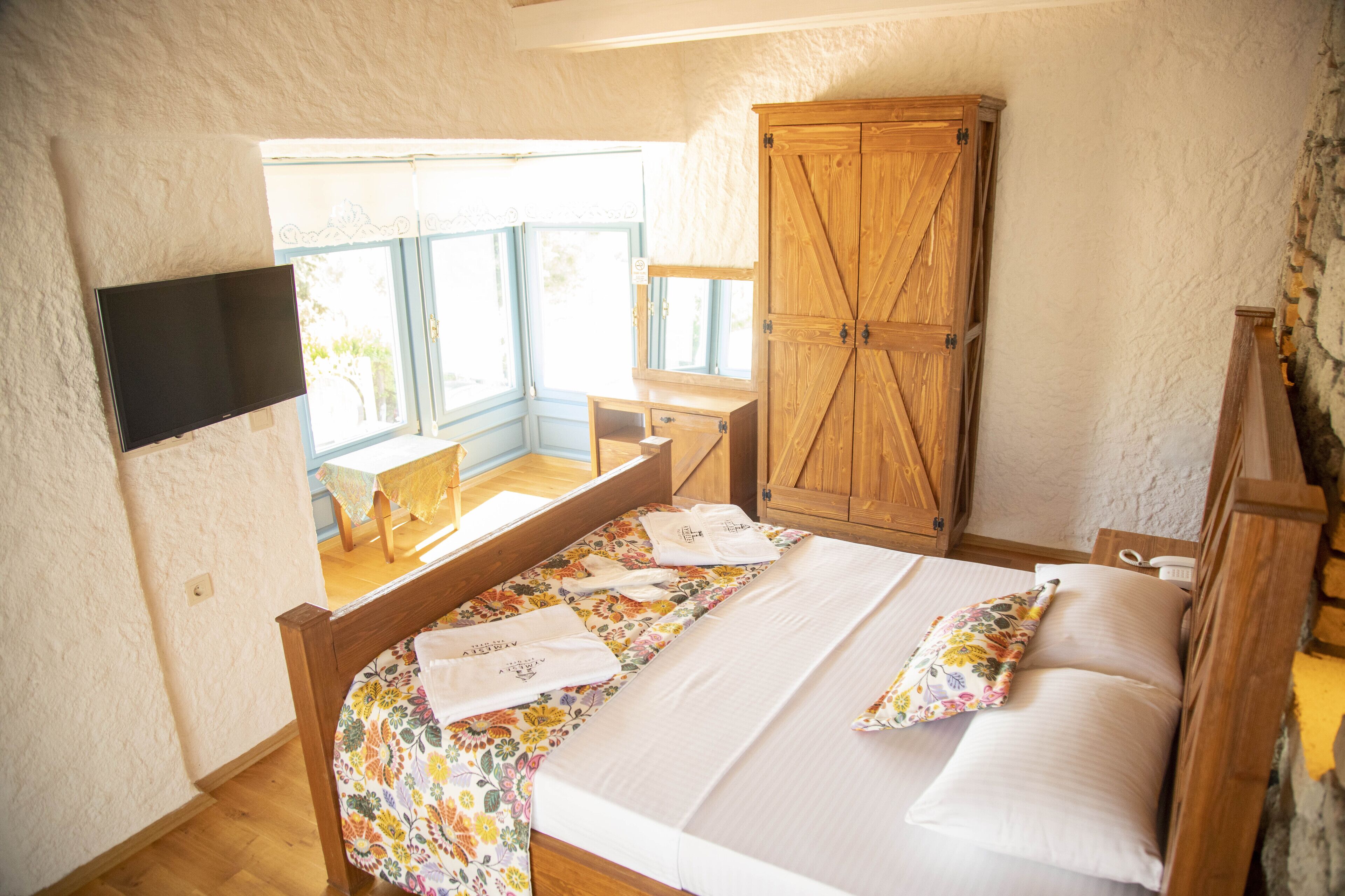 junior room | iron/ironing board, bed sheets