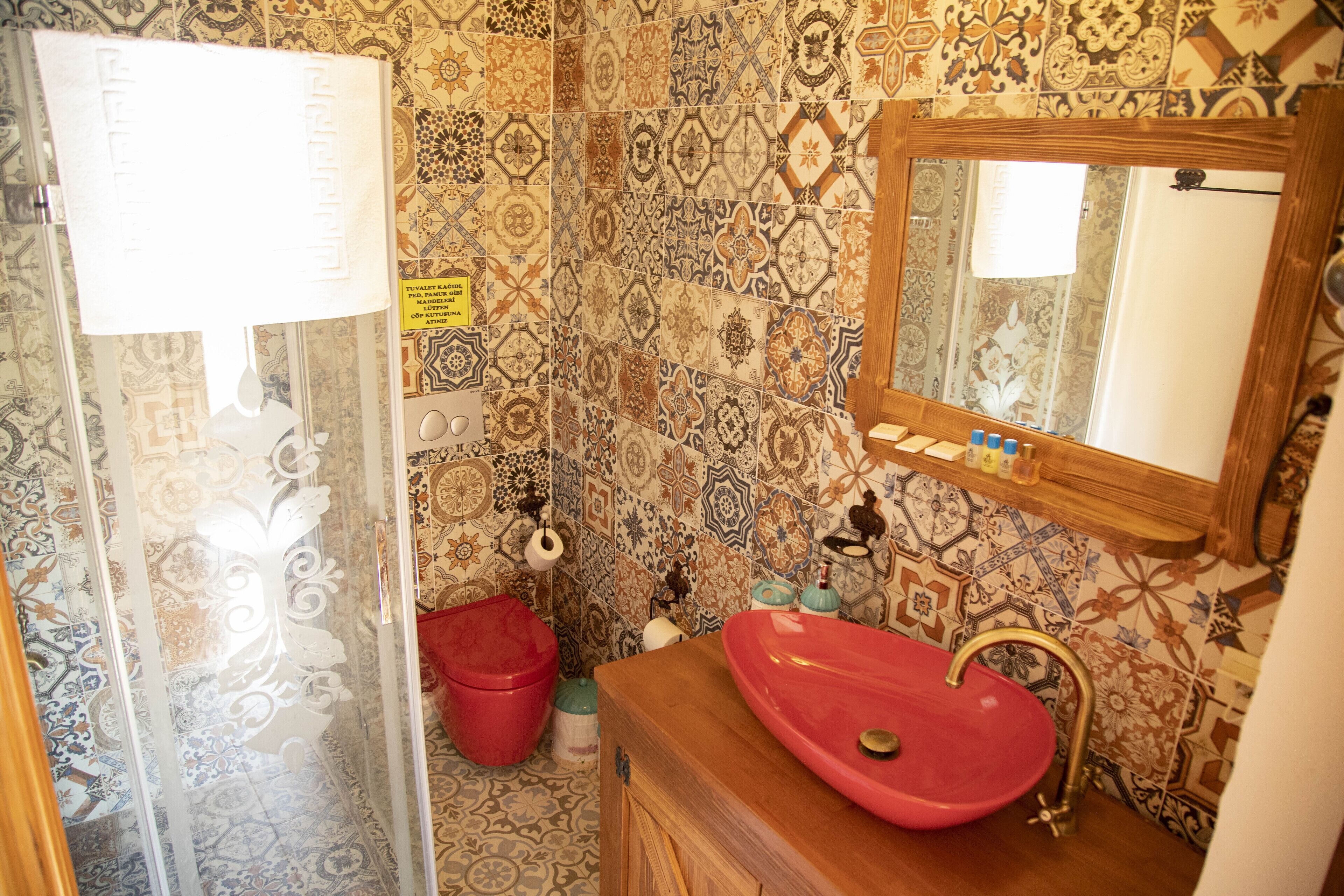 junior room | bathroom | shower, rainfall showerhead, hair dryer, slippers