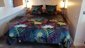 1 dormitorio, tabla de planchar con plancha, wifi gratis y ropa de cama