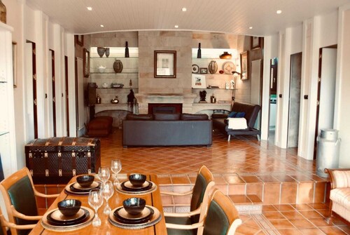 Individual chalet with winery among vineyards