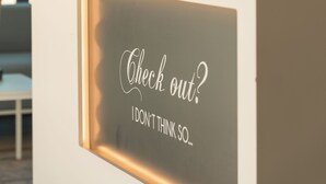 A reception desk with a sign that reads "Check out? I don't think so." - Soul Beach Hotel By Mc Adults Recommended (Denia)