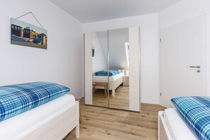 2 bedrooms, travel crib, WiFi, bed sheets