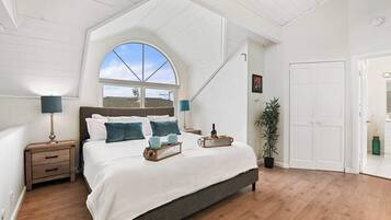 4 bedrooms, memory-foam beds, iron/ironing board, travel cot